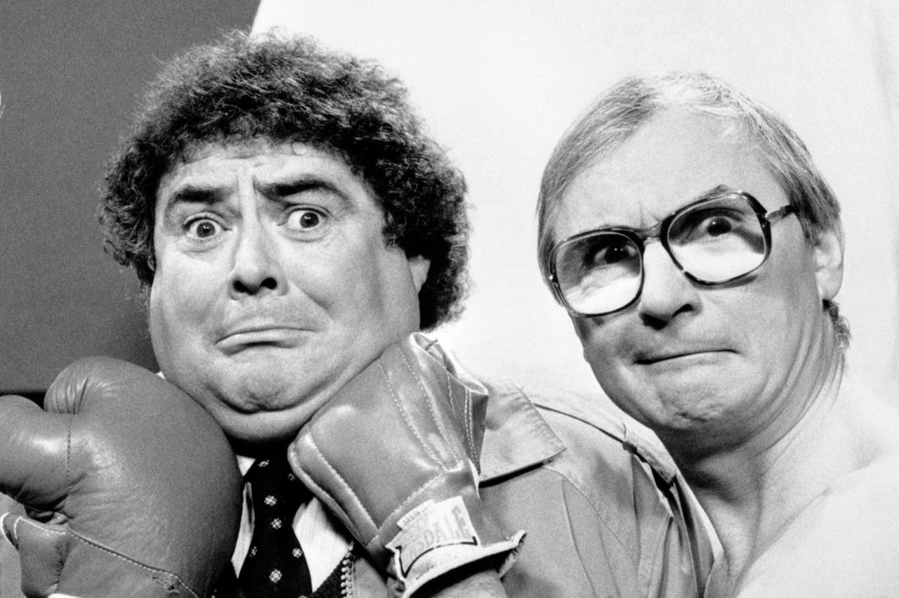 Syd Little Joins Mourners For Eddie Large’s Funeral