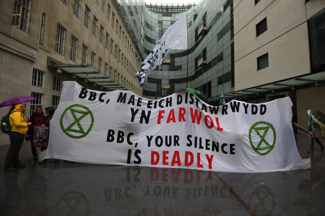 Protesters block the entrance to the BBC in London 