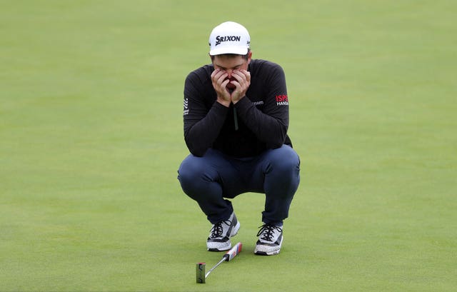 USA’s Keegan Bradley falls to his knees after a missed putt