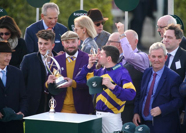 Cameron Sword, Thomas Kendall, and Derek Fox celebrate after winning the National 