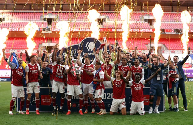 Arsenal lift the FA Cup in an empty Wembley