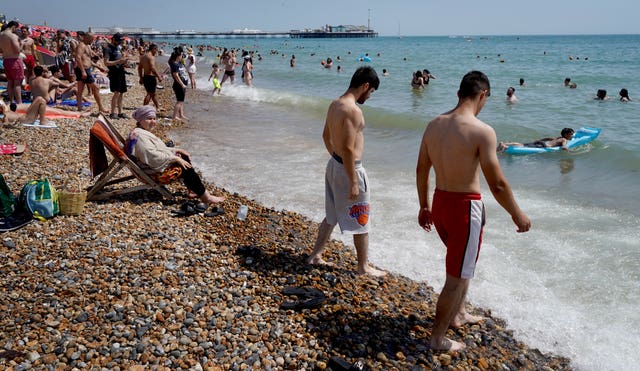 People on the beach in Brighton, East Sussex
