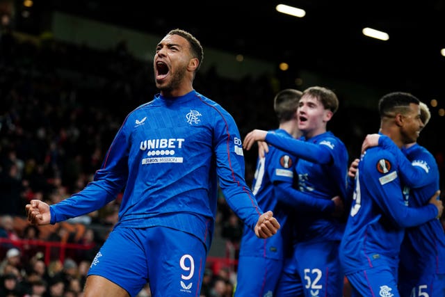 Rangers’ Cyriel Dessers (left) celebrates