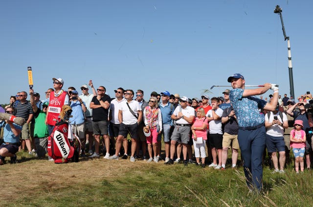 Spectators in shorts at The Open 