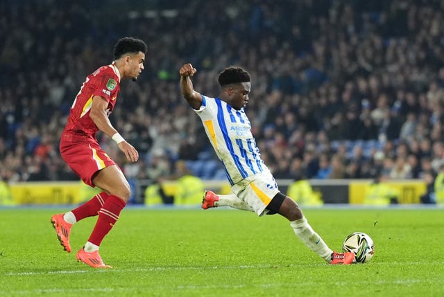 Brighton defender Tariq Lamptey takes a shot with his left foot