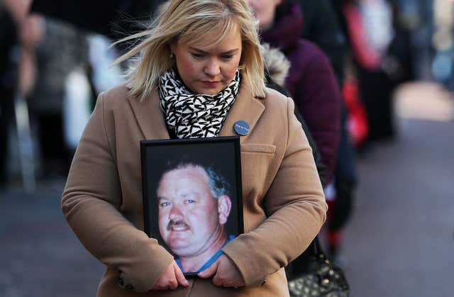 Emma Rogan, holds a photo of her father Adrian who was shot dead in Loughinisland in 1994 (Brian Lawless/PA)