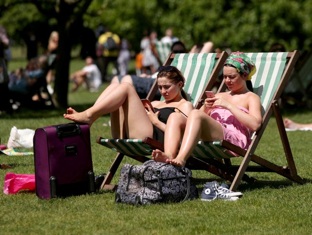 Hopes that temperatures could tip 30C (86F) are 'less likely', according to the Met Office (Yui Mok/PA)