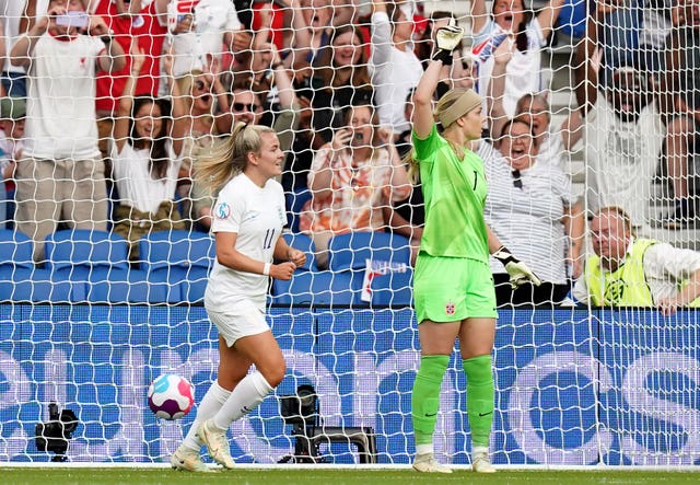 Lauren Hemp, left, celebrates her goal against Norway