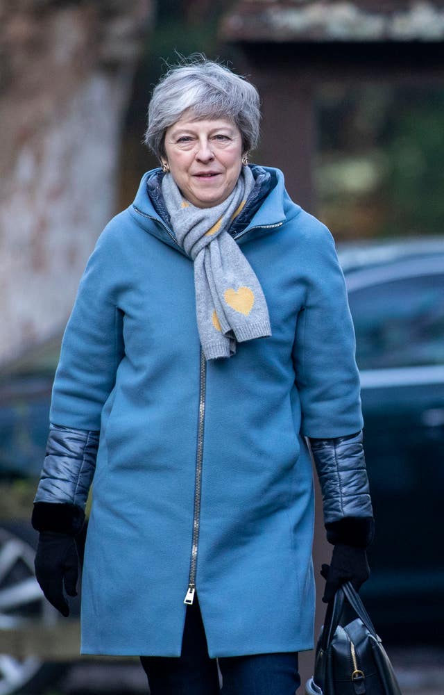 Theresa May attends church