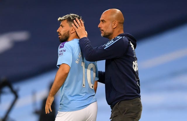 Guardiola (right) expects it to take time for Aguero (left) to get back to his best