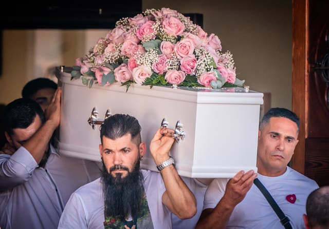 The coffin of  Alice da Silva Aguiar being taken from St Patrick’s Church 