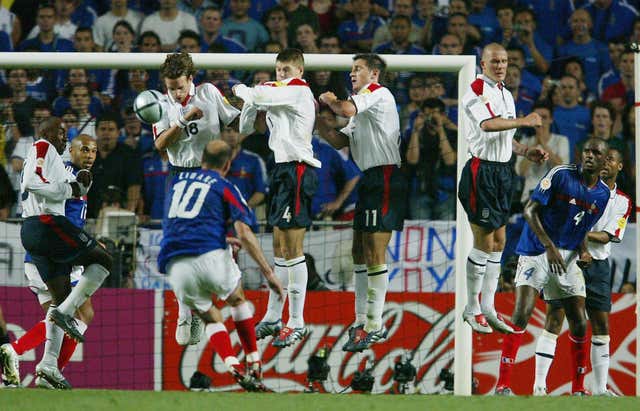 Zinedine Zidane scores a stoppage-time winner for France against England