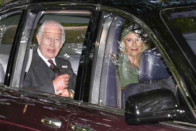 The King and Queen sat next to one another as they arrive at church 