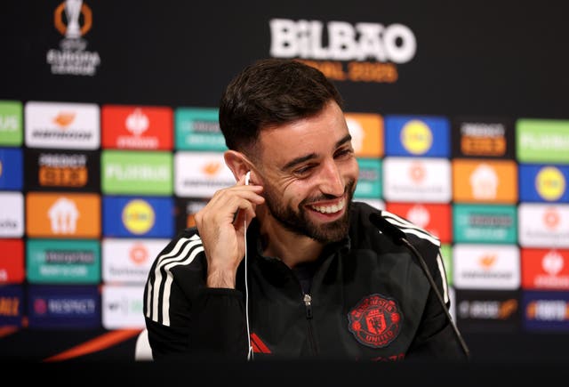 Manchester United captain Bruno Fernandes laughs during a Europa League final press conference