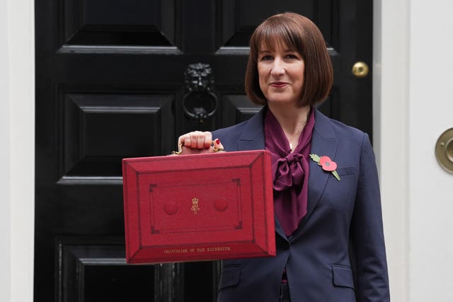 Rachel Reeves poses outside 11 Downing Street with her ministerial red box