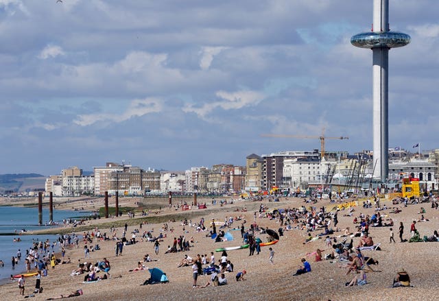 People on the beach in Brighton, East Sussex