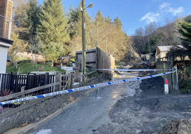 Debris on a street in Cwmtillery, Wales, where a mudslide forced residents from their homes