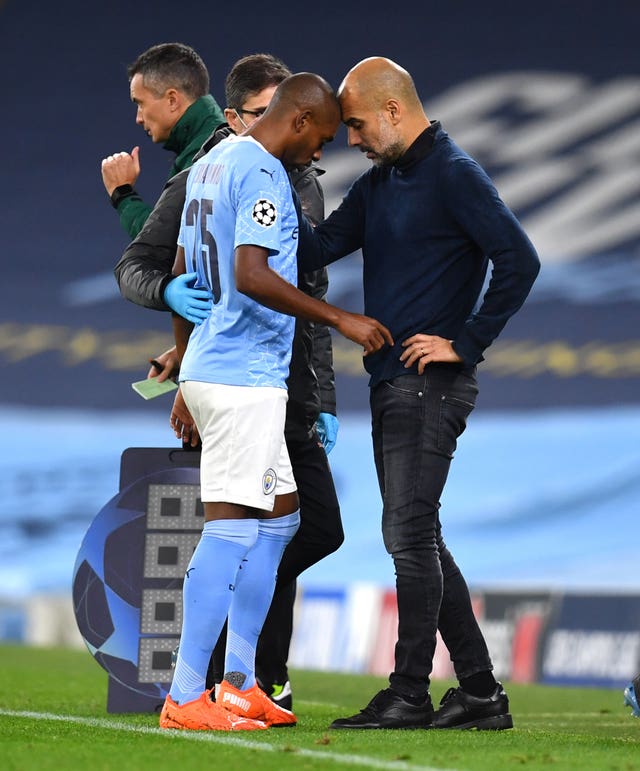 City manager Guardiola (right) has been impressed with Fernandinho (left) this season