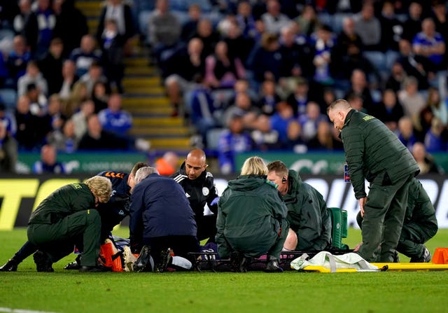 Everton’s Seamus Coleman is placed on a stretcher after suffering a knee injury at Leicester