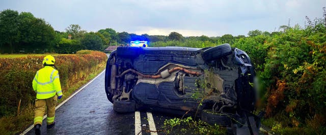 The aftermath of a single-vehicle collision on the B2135 near Partridge Green (PC Tom Van Der Wee/PA)