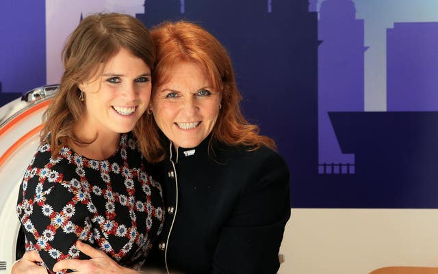Sarah, Duchess of York with her daughter Princess Eugenie during a visit to the Teenage Cancer Trust ward at Alder Hey Hospital, Liverpool. Peter Byrne/PA Wire