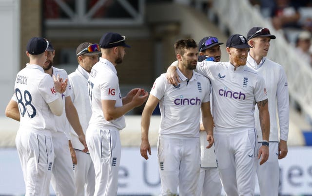 England cricketers celebrate against the West Indies