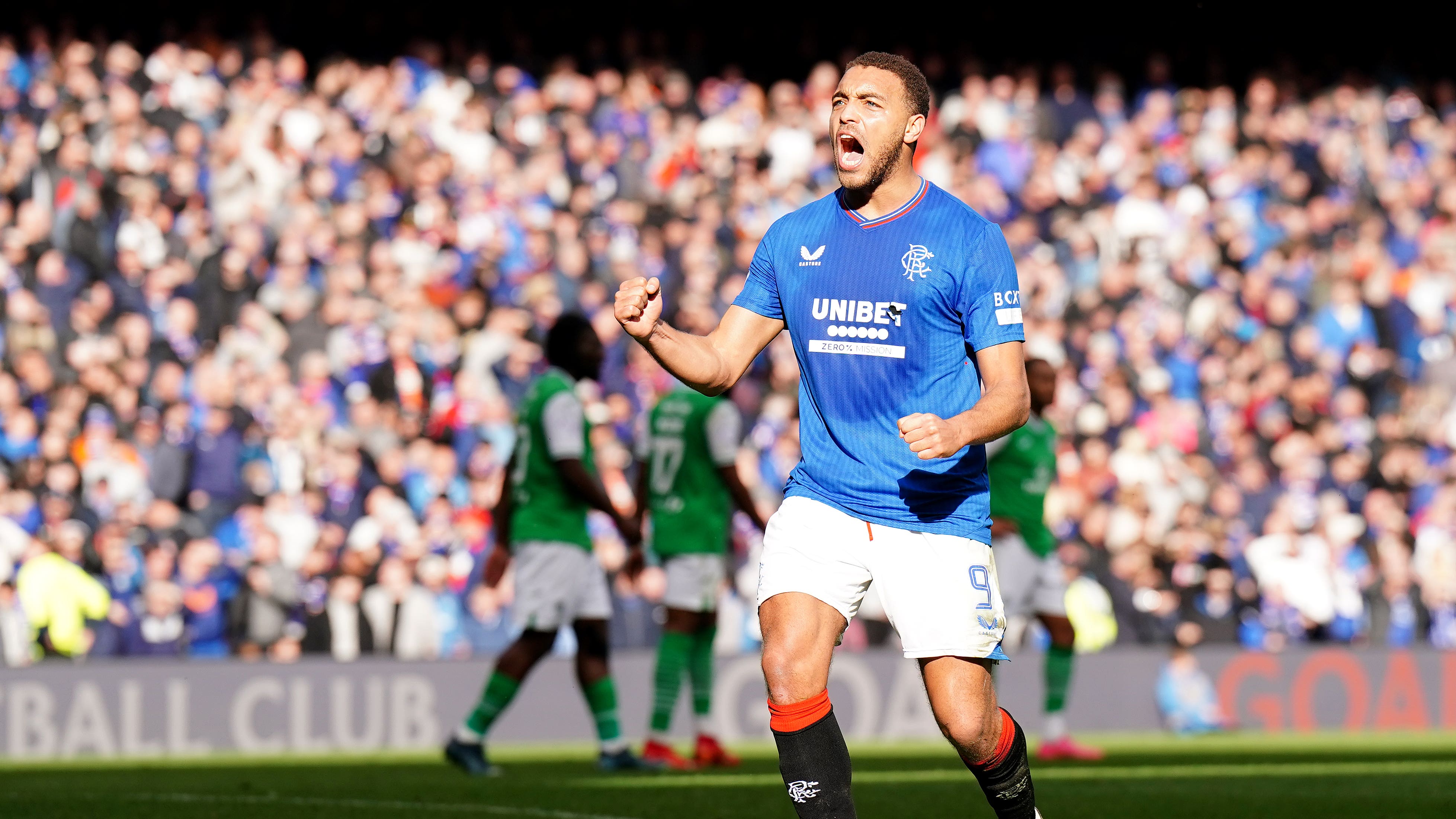 Rangers’ Cyriel Dessers scores against Hibernian (Jane Barlow/PA)