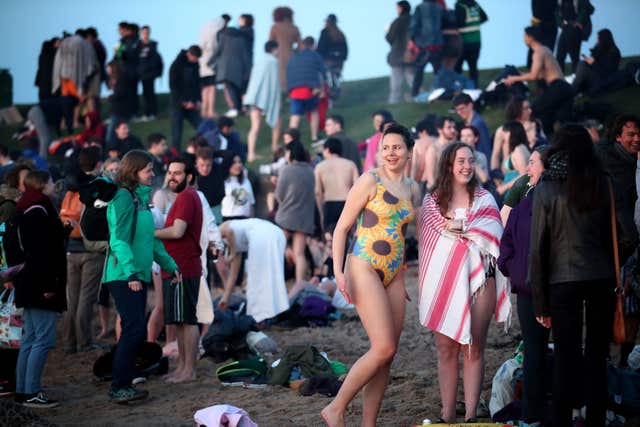 Drying out after the dip (Jane Barlow/PA)