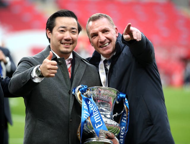 Khun Top (left) and Brendan Rodgers celebrate Leicester's success