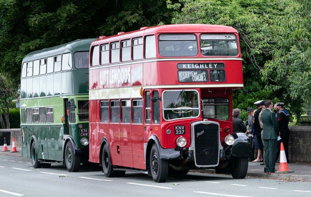 Buses that carried members of the guard of honour at Morton Cemetery, Riddlesden, Keighley, following the interment of Captain Sir Tom Moore’s ashes