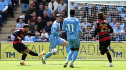 Queens Park Rangers’ Ilias Chair (left) scores their side’s first goal of the game during the Sky Bet Championship match at the Coventry Building Society Arena, Coventry. Picture date: Saturday May 4, 2024.