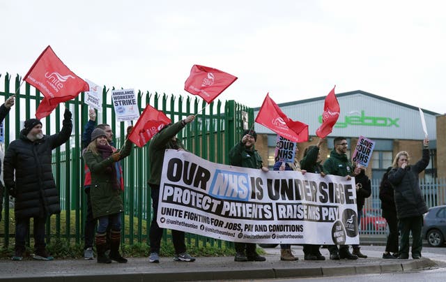 Ambulance workers on the picket line outside ambulance headquarters in Coventry (Jacob King/PA)