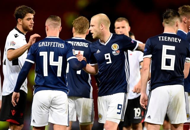 The Scotland team celebrate beating Albania