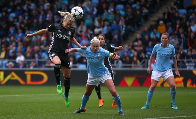 Lyon striker Ada Hegerberg, left, has not played for Norway since 2017