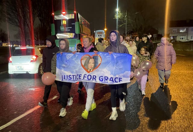 Siobhan Lynch (front centre), the mother of a teenage girl who died after a scrambler crash in north Dublin, takes part in a walk in memory of her daughter Grace