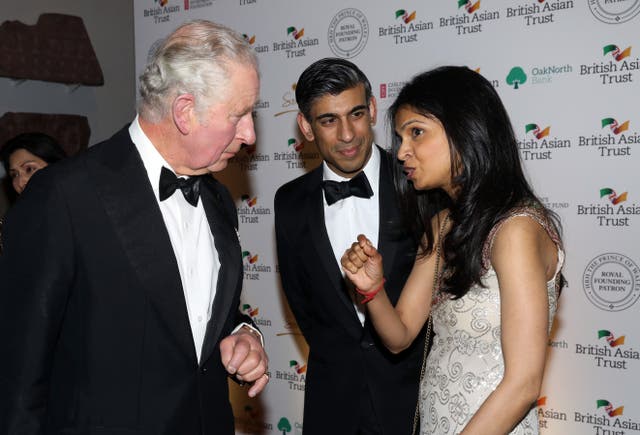 The Prince of Wales speaks to Chancellor Rishi Sunak and Akshata Murthy