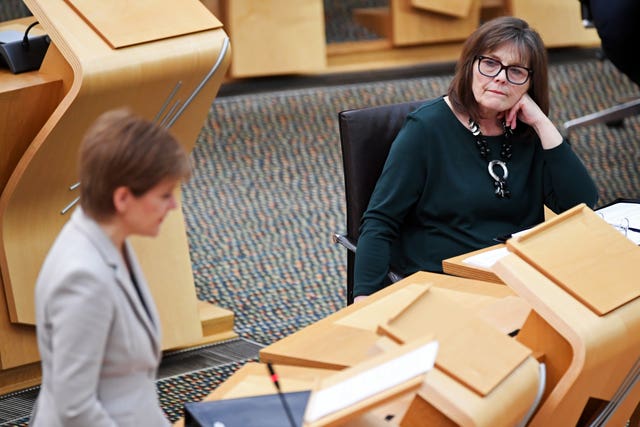 Then-health secretary Jeane Freeman in the Scottish Parliament in Edinburgh with then-first minister Nicola Sturgeon in 2021