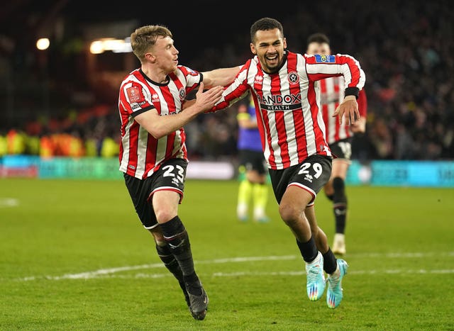 Iliman Ndiaye (right) fired Sheffield United into the quarter-finals