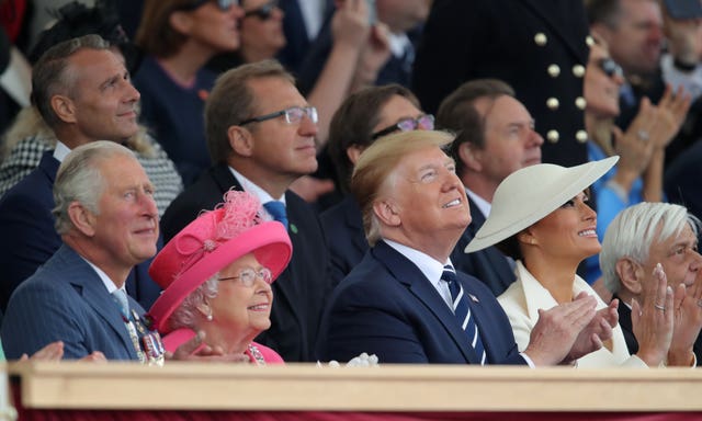 The then-Prince of Wales, Queen Elizabeth II, then-US president Donald Trump and Melania Trump