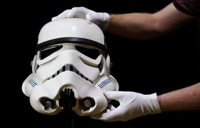 The Screen-Matched Tantive IV Stormtrooper Helmet is estimated to fetch between 6. £120,000-180,000 (Andrew Matthews/PA)