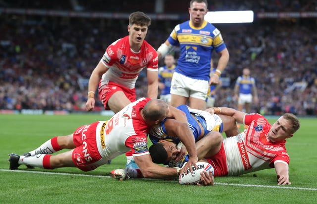 Kruise Leeming, centre, scores to keep Leeds in the game