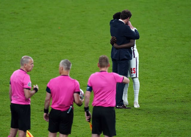 England manager Gareth Southgate consoles Bukayo Saka after the penalty shoot-out