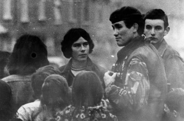 Photo dated February 1977 of Grenadier Guards Captain Robert Nairac talking to children in Belfast