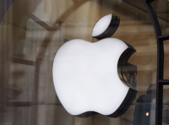 The Apple logo in a store window