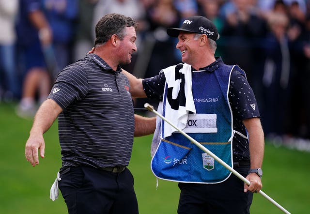 Ryan Fox celebrates with his caddie