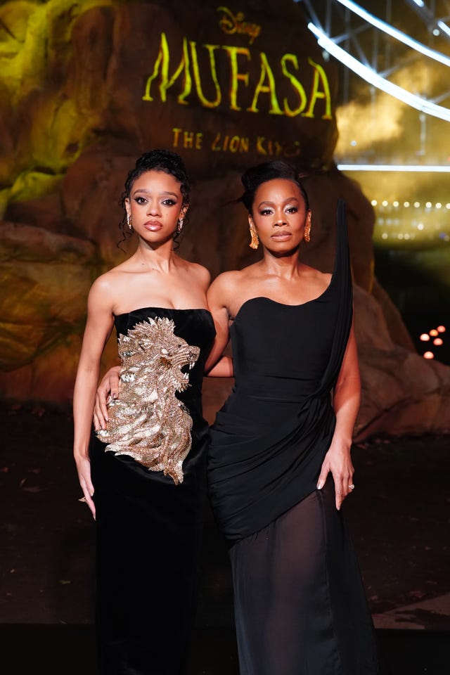 Tiffany Boone with her embroidered gown, and Anika Noni Rose