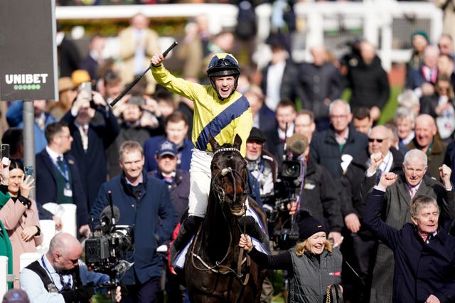 Michael O’Sullivan salutes the crowd aboard Marine Nationale