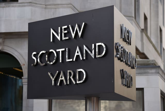 New Scotland Yard sign outside the Metropolitan Police headquarters 