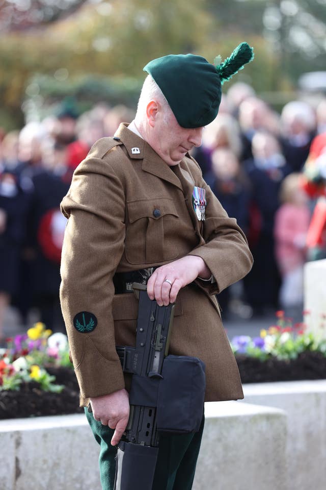 A member of the Armed forces during the service in Enniskillen 