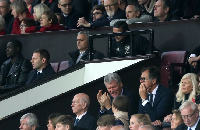 Jose Mourinho, centre, watches from the crowd against Burnley in 2016